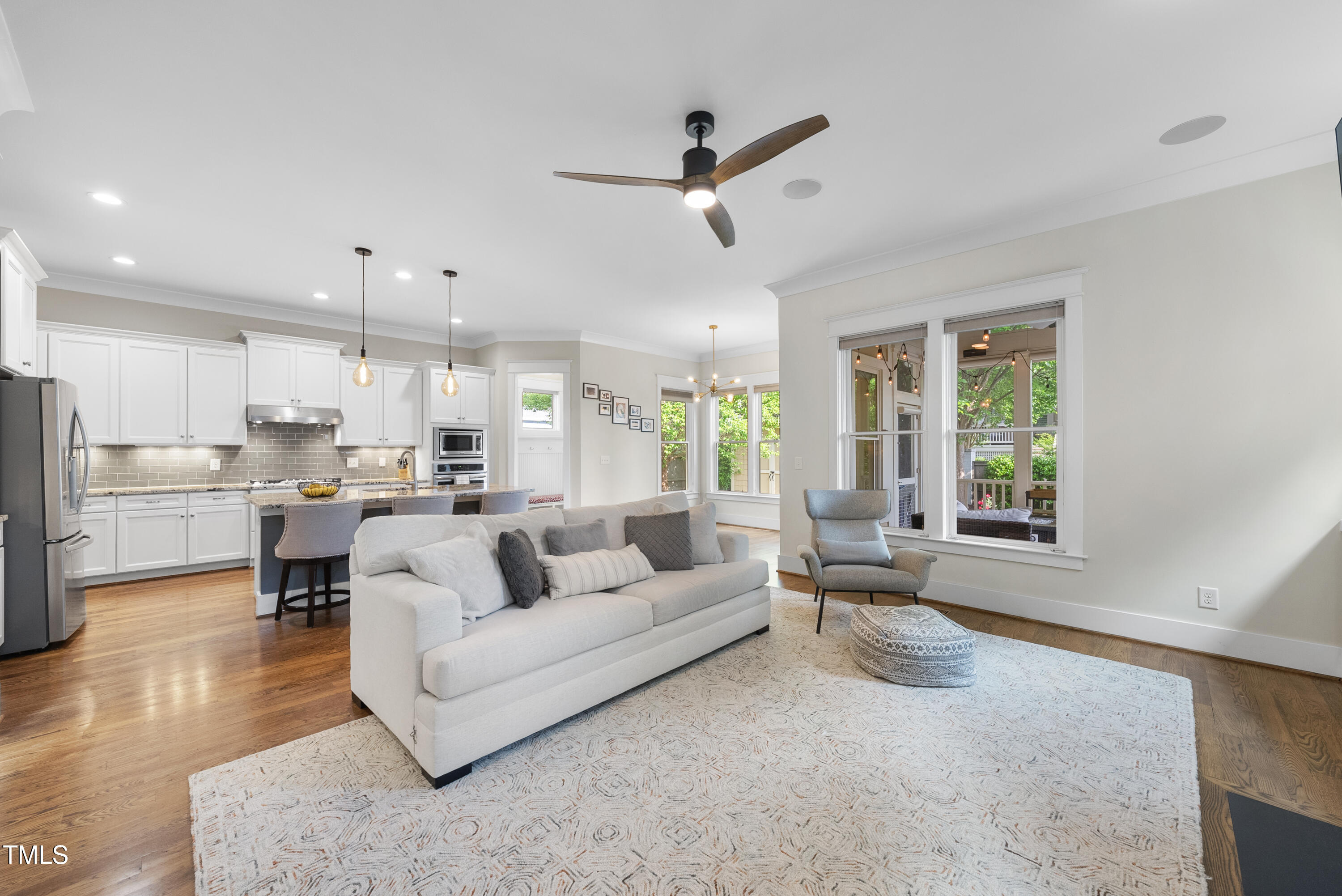 707 Sasser Street Raleigh, NC 27604 - Photo 11 of 38 a living room with furniture and a large window