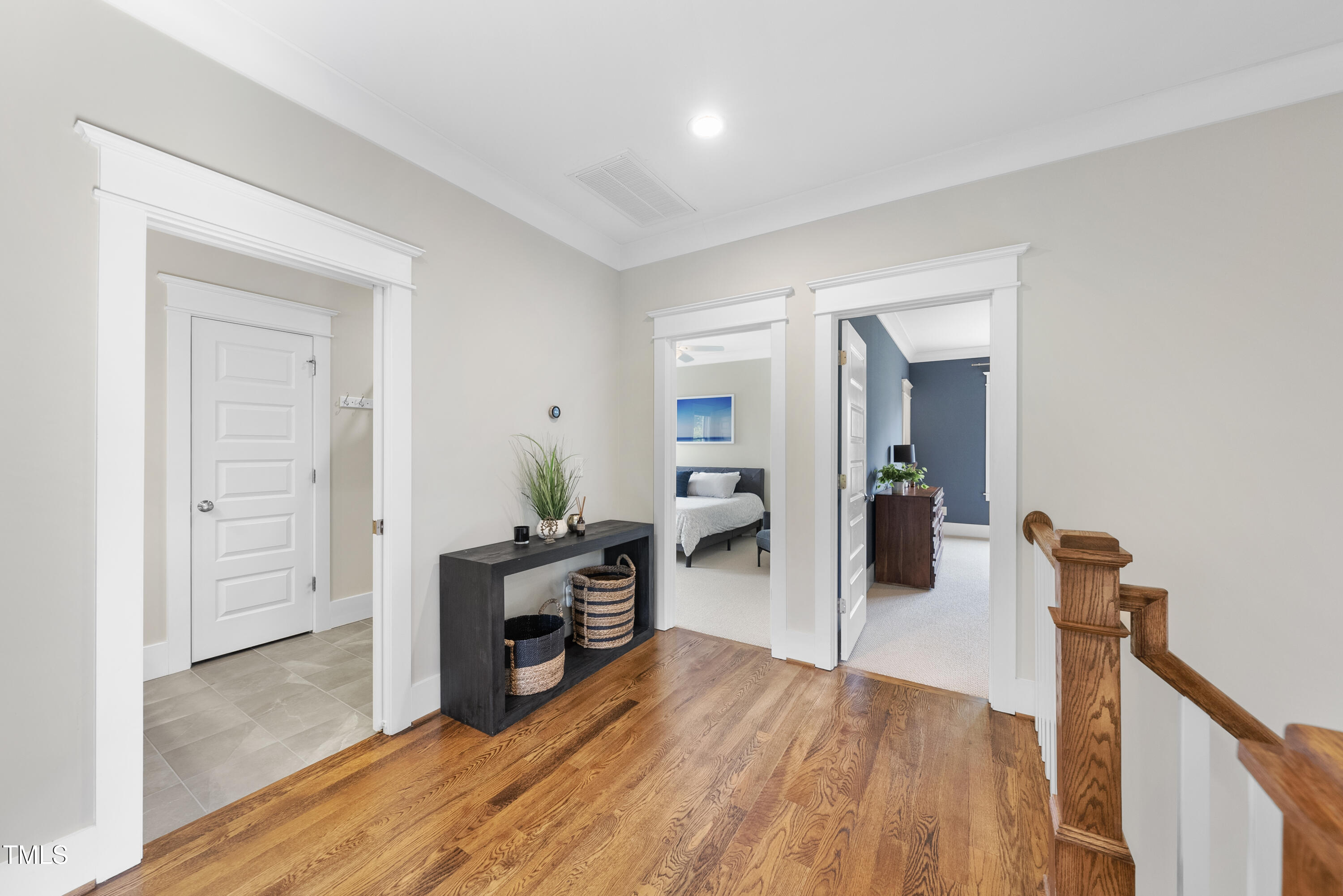 707 Sasser Street Raleigh, NC 27604 - Photo 17 of 38 a view of a room with wooden floor and furniture