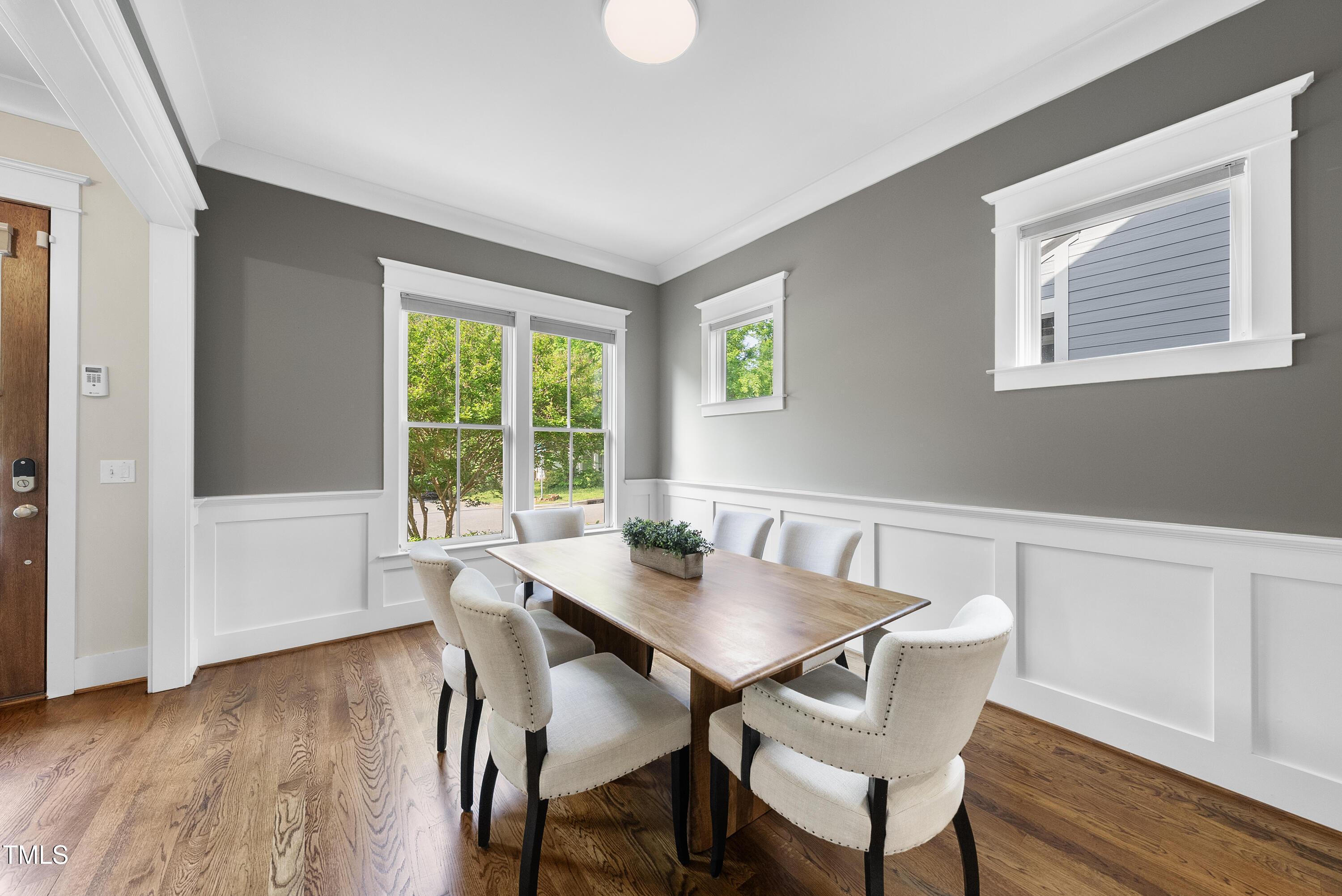 707 Sasser Street Raleigh, NC 27604 - Photo 2 of 38 a view of a dining room with furniture window and wooden floor