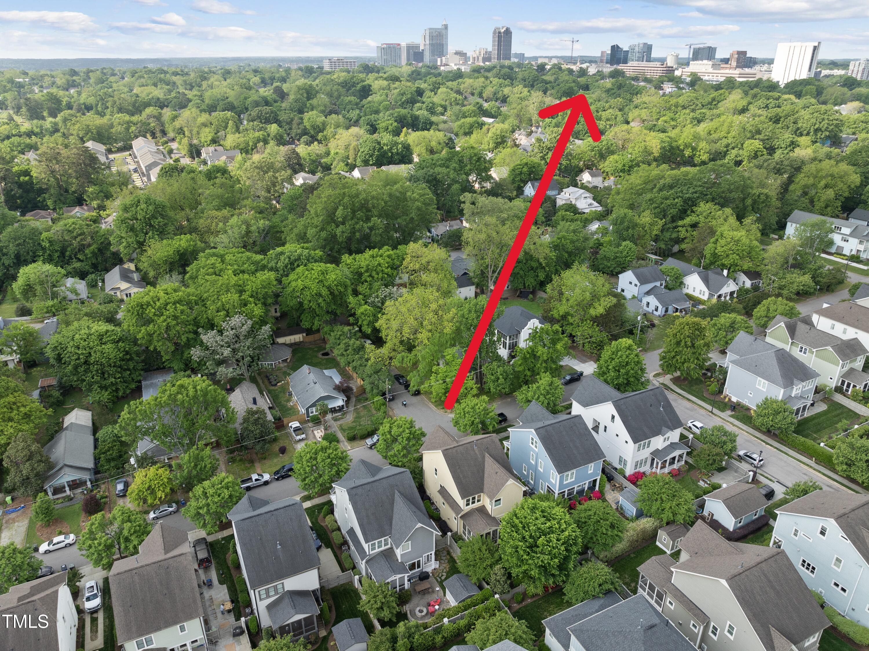 707 Sasser Street Raleigh, NC 27604 - Photo 32 of 38 an aerial view of a house with a yard