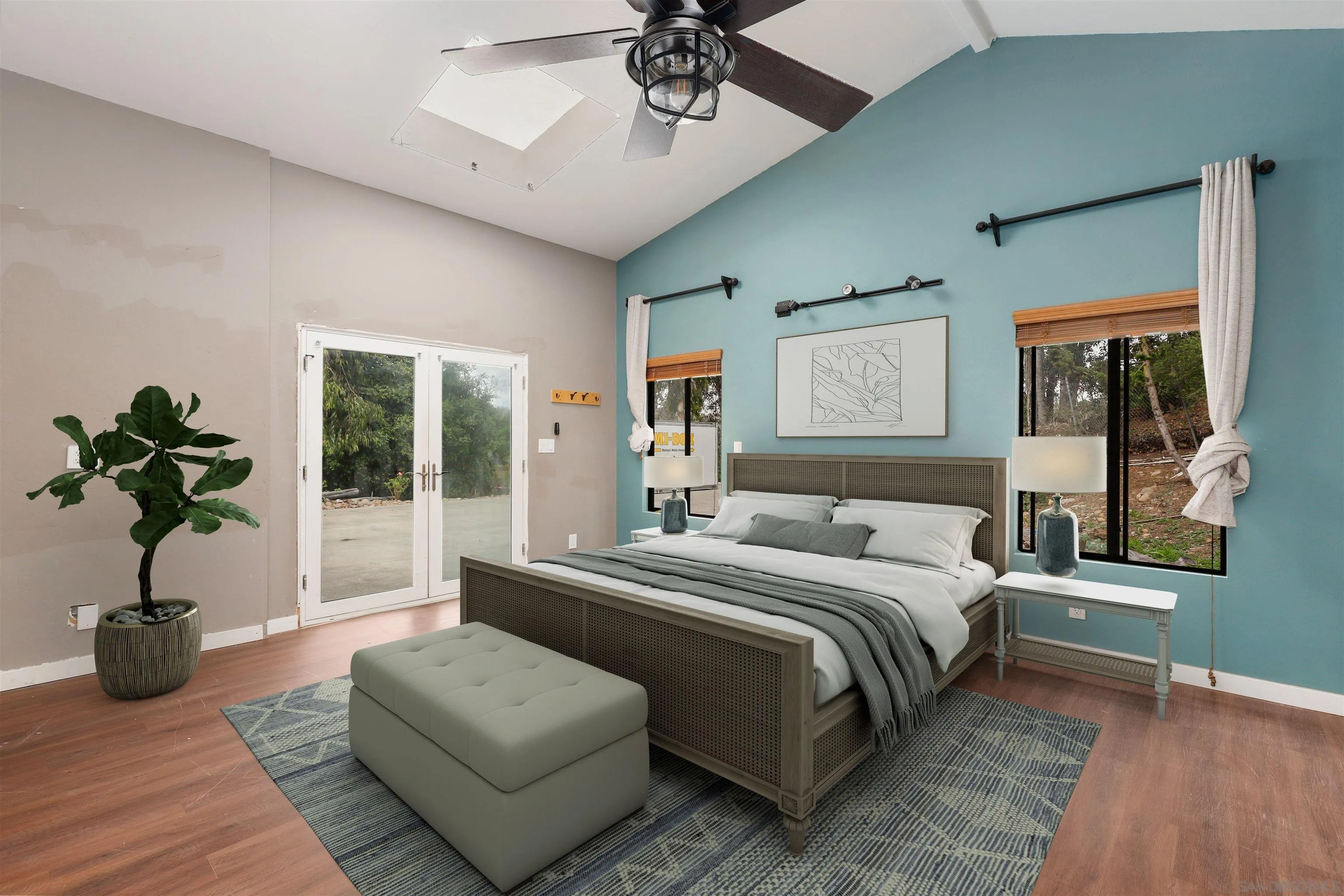 12256 Old Stone Road Poway, CA 92064 - Photo 18 of 31 a bedroom with a bed furniture and a potted plant