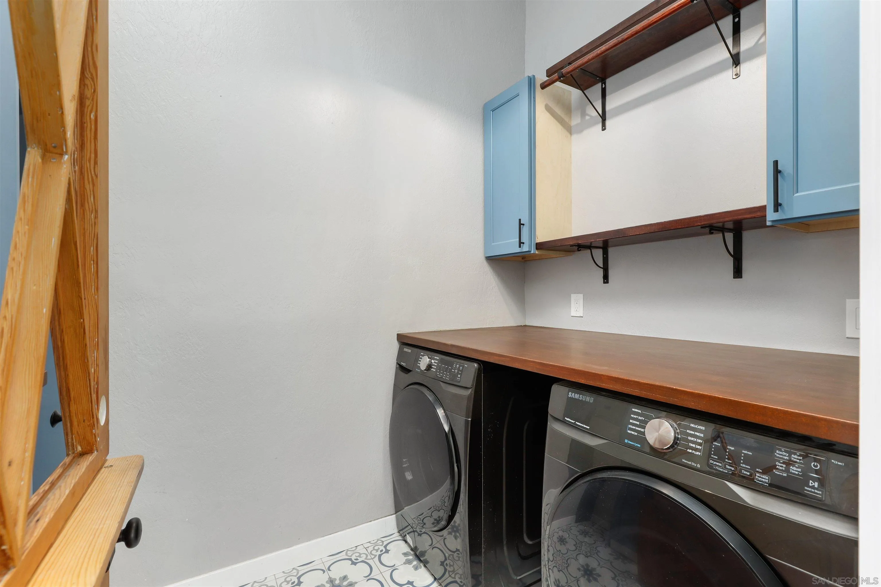 12256 Old Stone Road Poway, CA 92064 - Photo 22 of 31 a utility room with dryer and washer