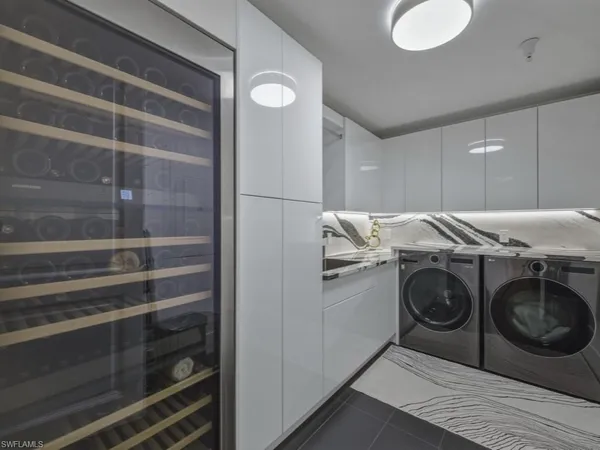 a utility room with washer and dryer