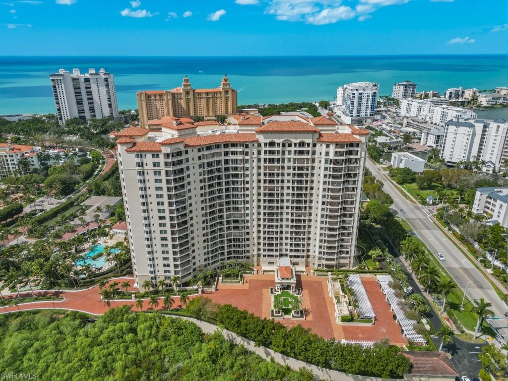 8787 Bay Colony Drive, Unit 306 Naples, FL 34108 - Photo 37 of 40 a view of a balcony with city view
