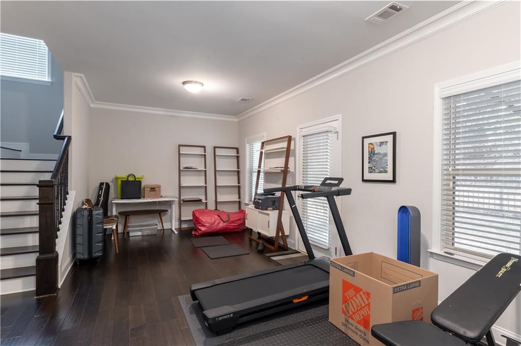 1940 Townsend Court, Unit 15 Atlanta, GA 30329 - Photo 23 of 36 a view of a room with gym equipment
