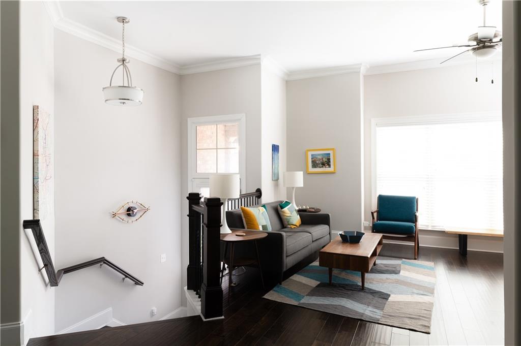 1940 Townsend Court, Unit 15 Atlanta, GA 30329 - Photo 7 of 36 a living room with furniture and a flat screen tv