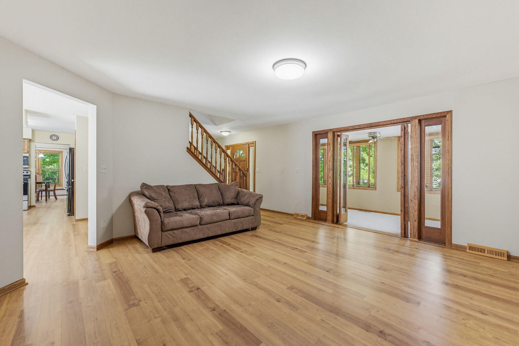 6912 North Tichigan Road Waterford, WI 53185 - Photo 8 of 52 Family Room open to Sunroom