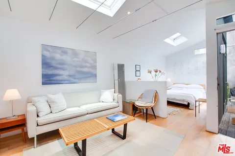 a living room with furniture and a couch