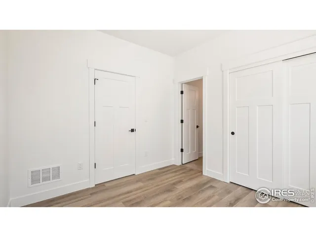 a bathroom with a sink a vanity and a window