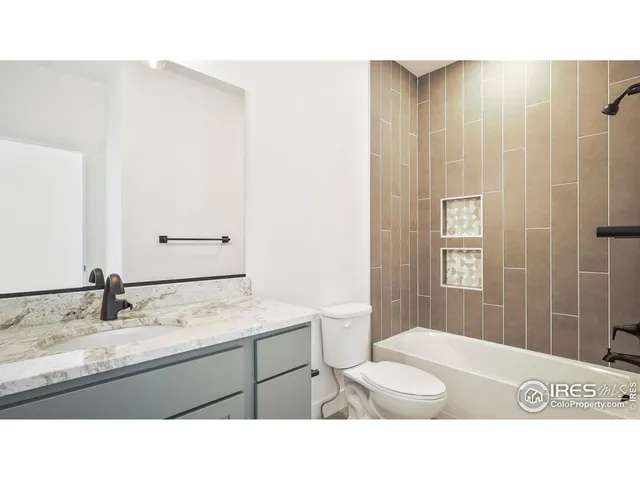 a open living room with a wooden floor