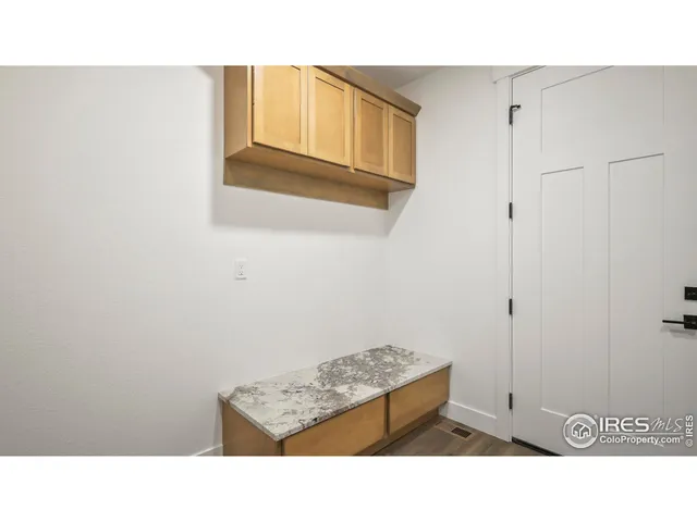 a black and white photo of a bathroom