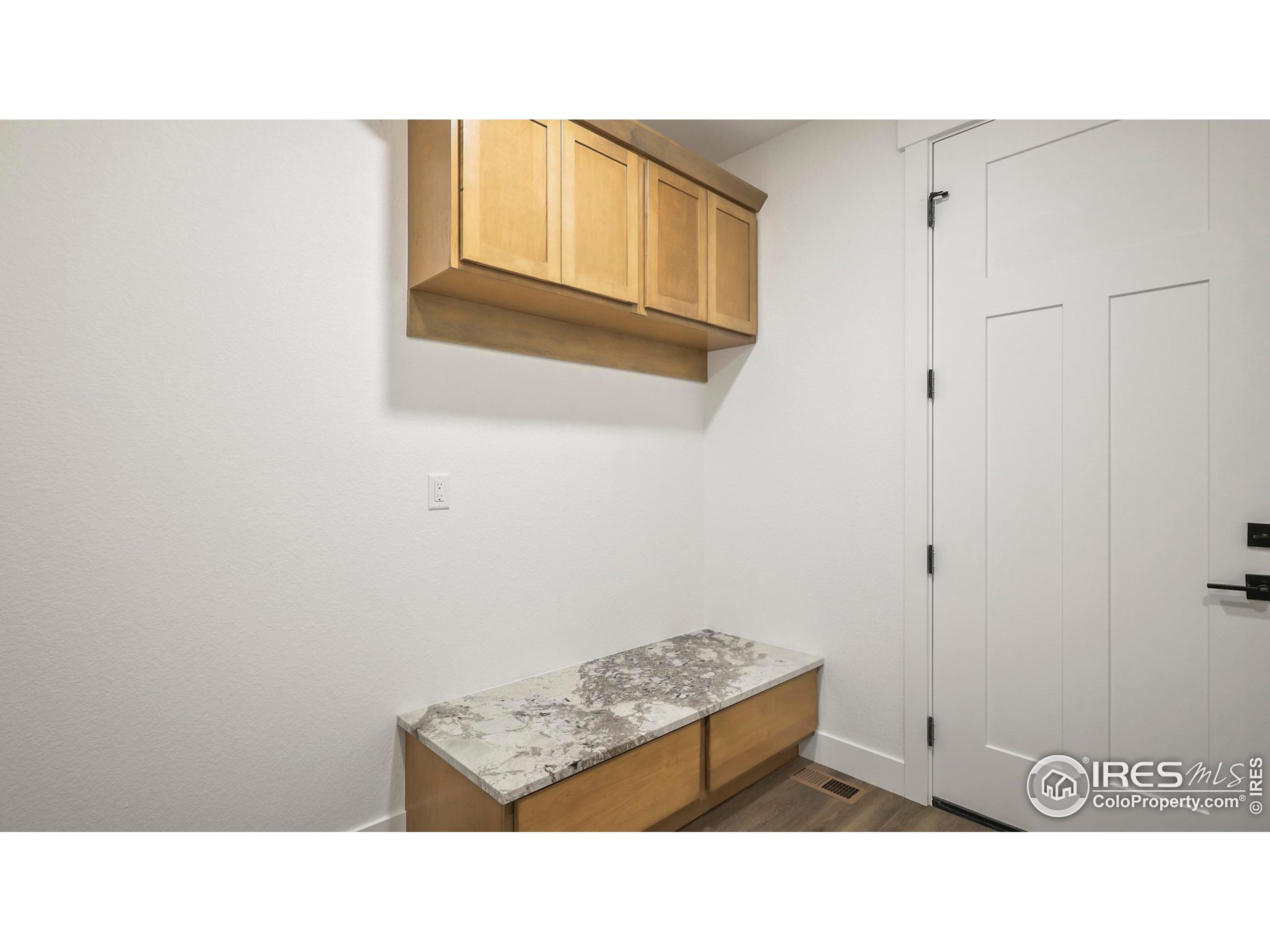 448 Cache Avenue Fort Morgan, CO 80701 - Photo 23 of 44 a open living room with a wooden floor