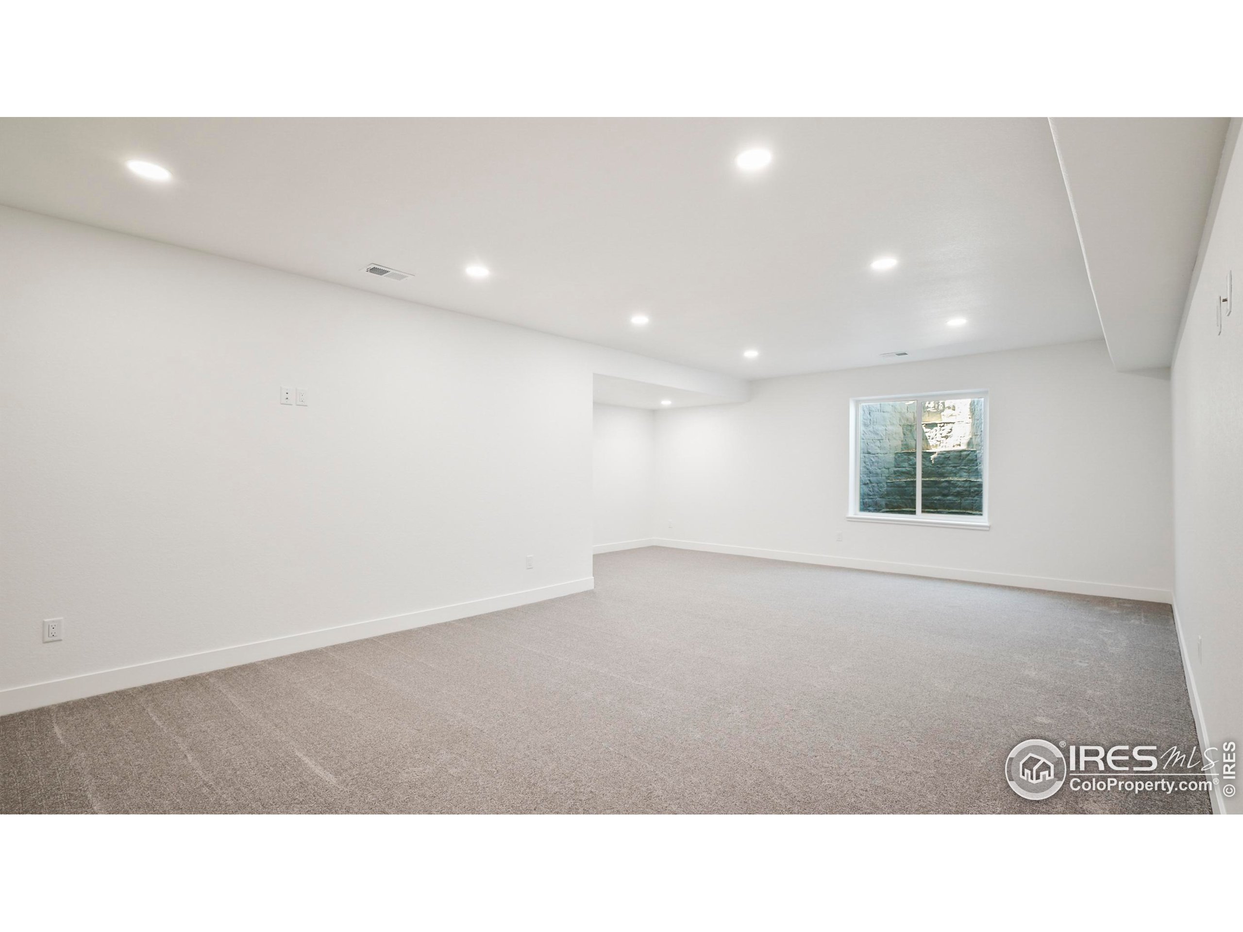 448 Cache Avenue Fort Morgan, CO 80701 - Photo 26 of 44 a open hall with a ceiling fan