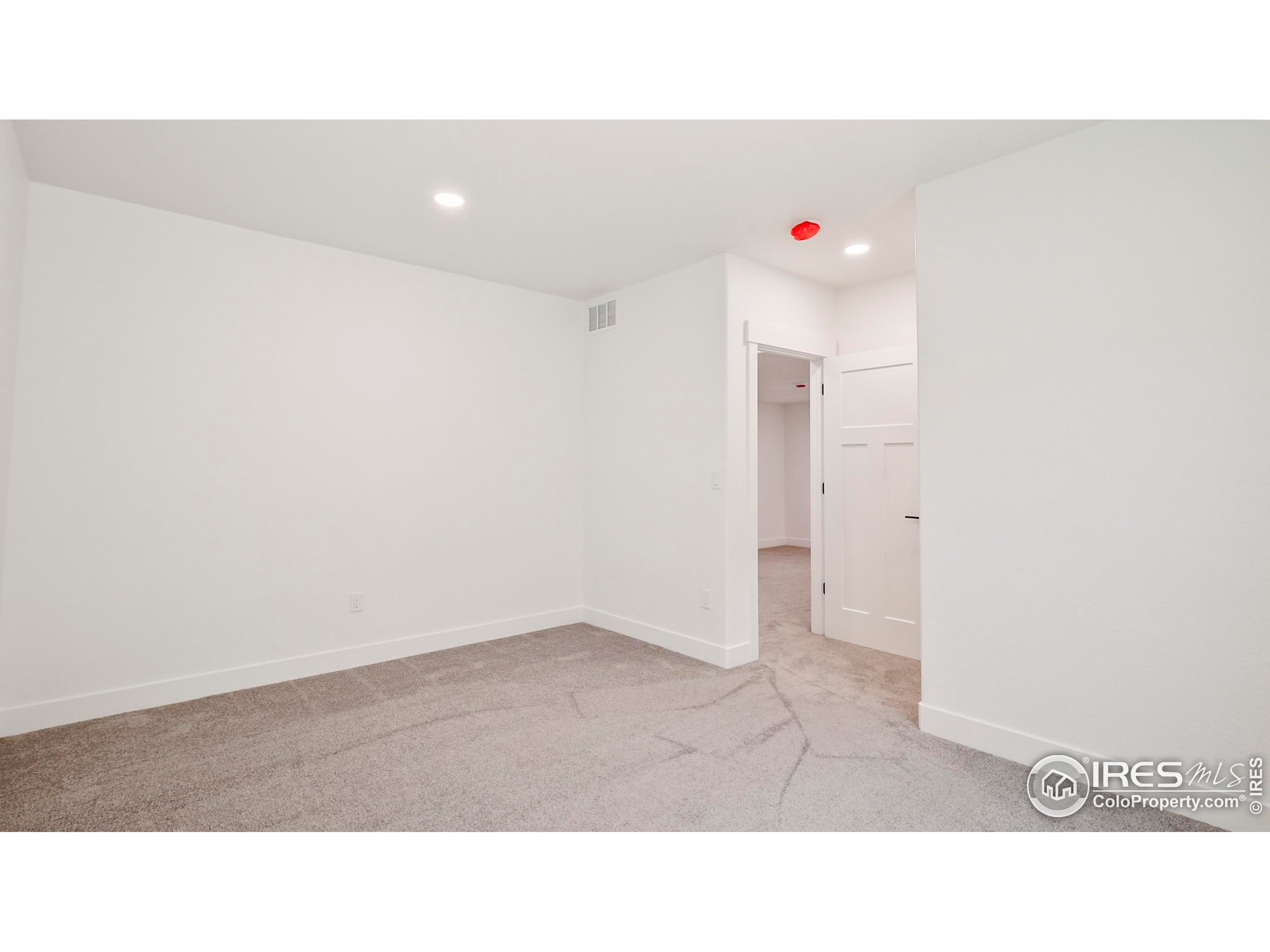 448 Cache Avenue Fort Morgan, CO 80701 - Photo 28 of 44 a open hall with a rug