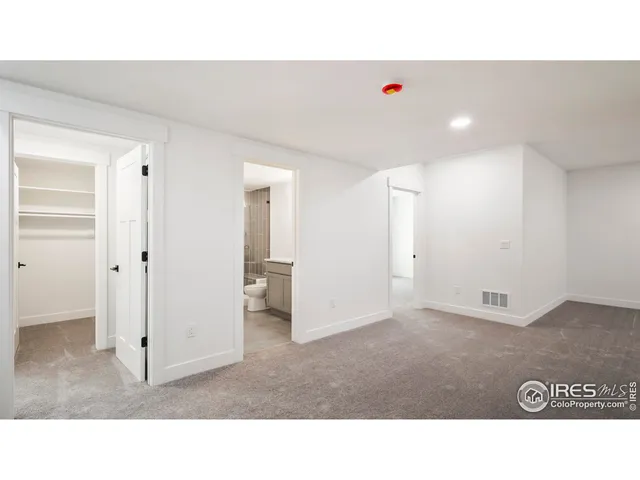 a black and white photo of a living room