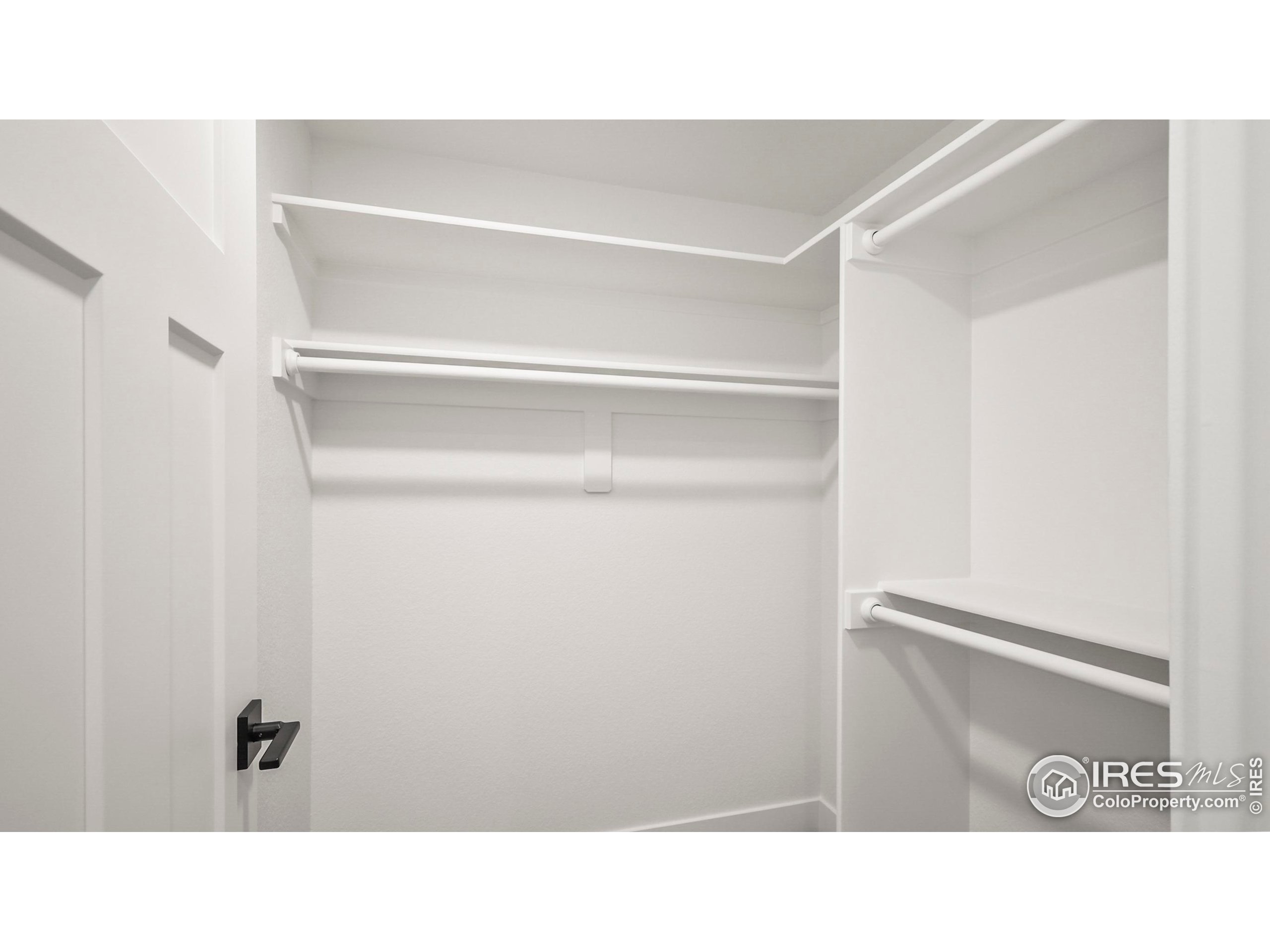 448 Cache Avenue Fort Morgan, CO 80701 - Photo 31 of 44 a open space with a cabinet and mirror