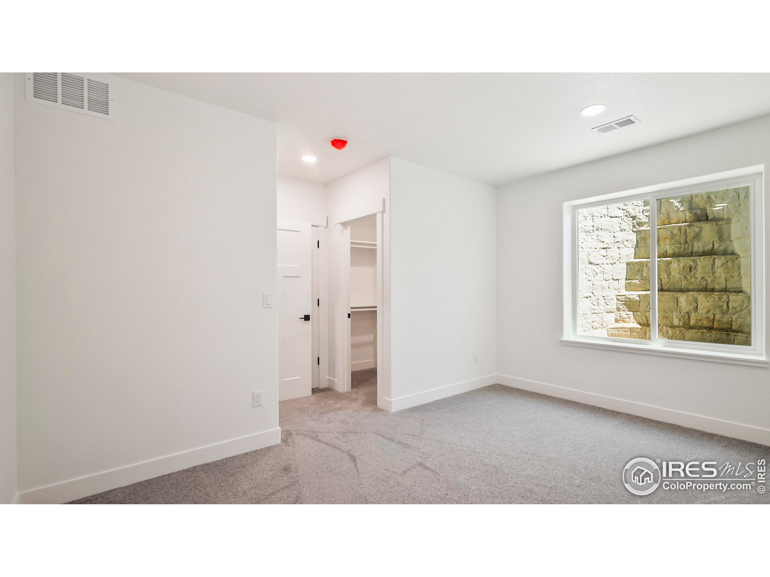 448 Cache Avenue Fort Morgan, CO 80701 - Photo 36 of 44 a open living room with a window and a table