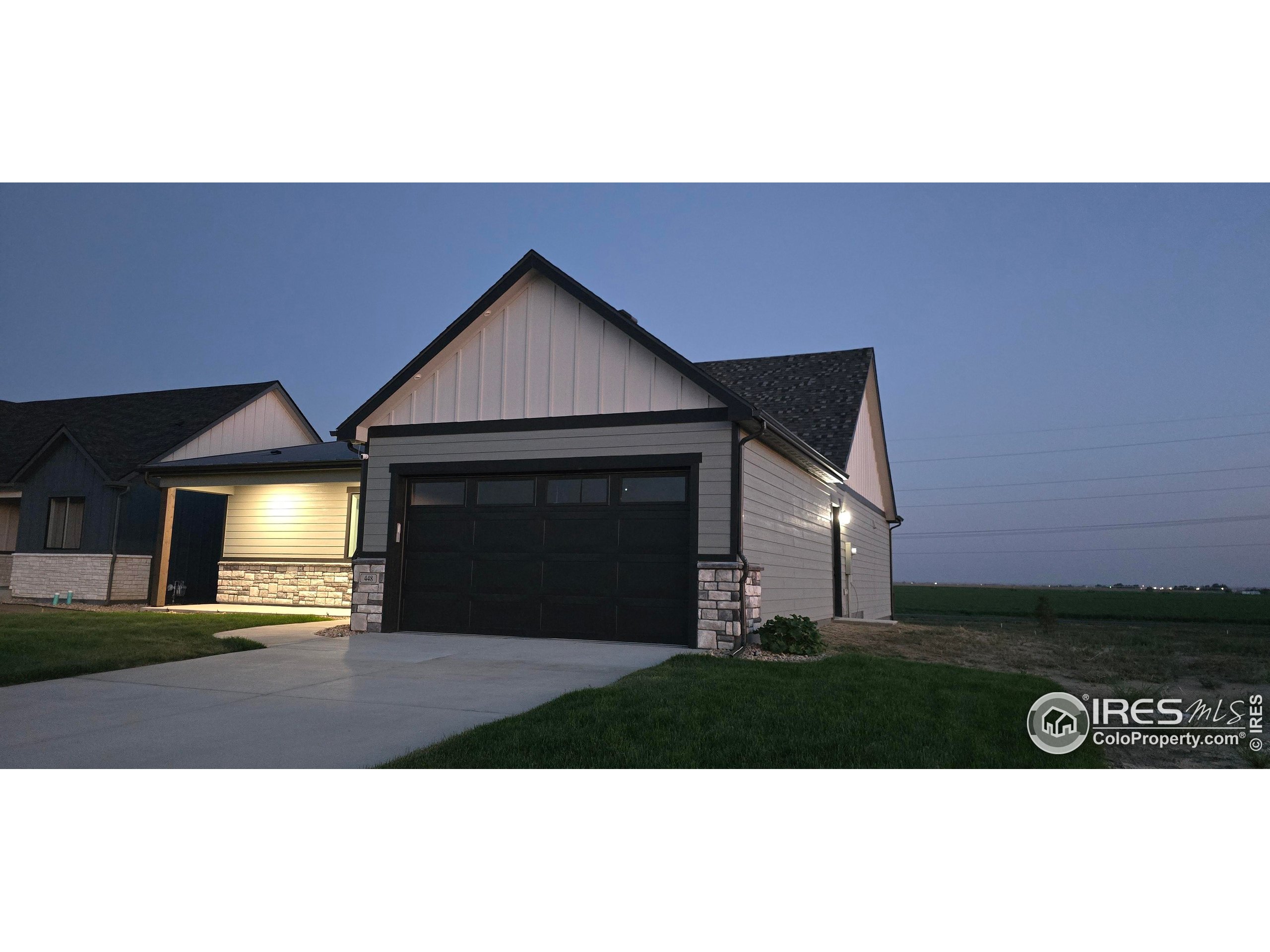 448 Cache Avenue Fort Morgan, CO 80701 - Photo 4 of 44 a view of a house with a yard
