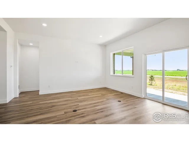 a room with a bed and a window