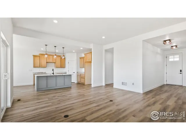 a bathroom with a sink a mirror and a shower