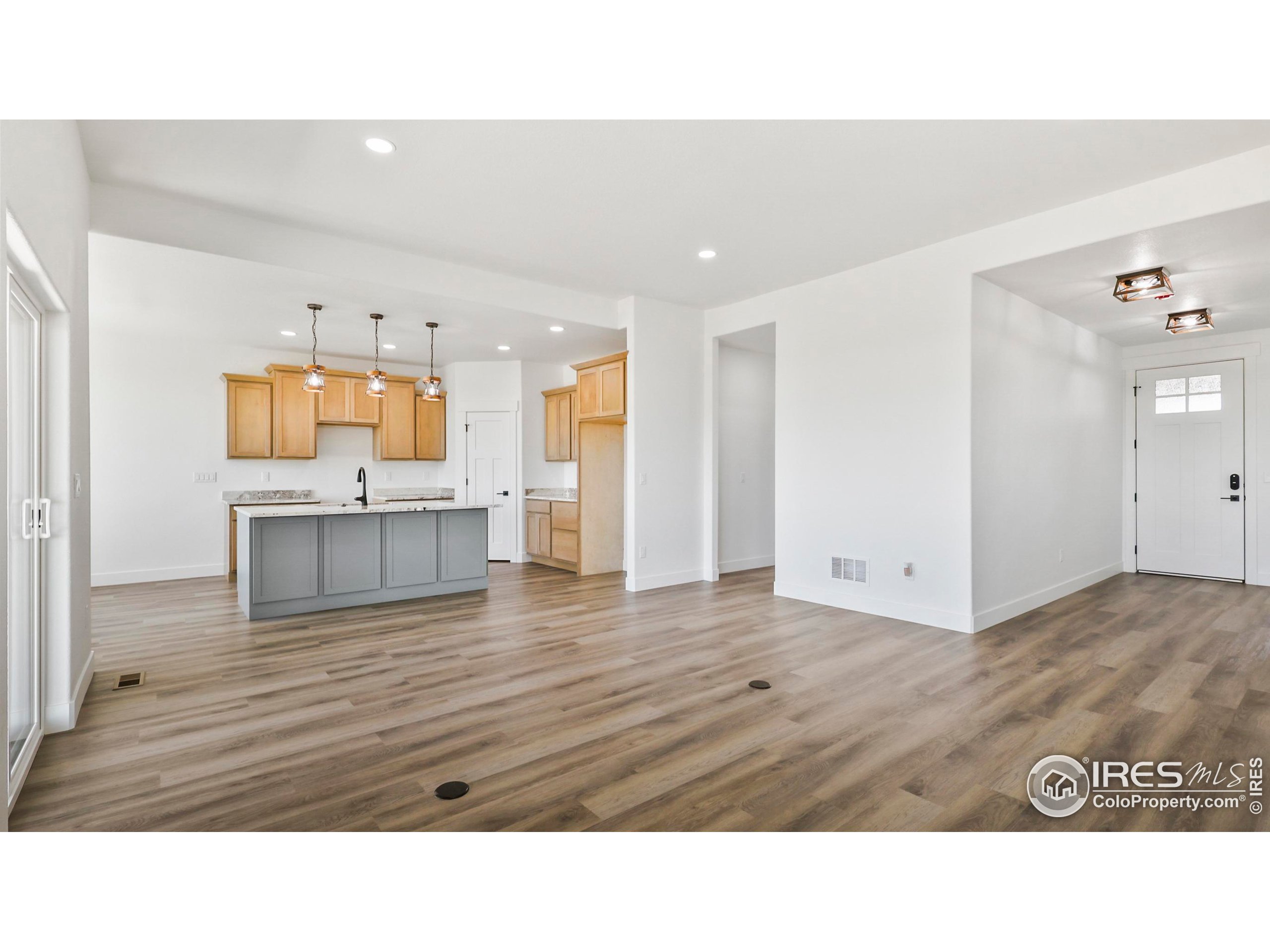 448 Cache Avenue Fort Morgan, CO 80701 - Photo 9 of 44 a bathroom with a sink a mirror and a shower
