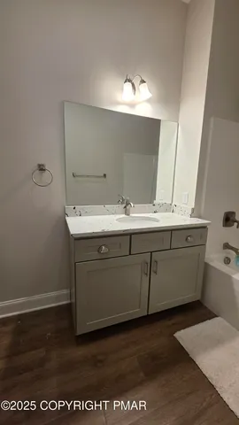 a view of small space with wooden floor