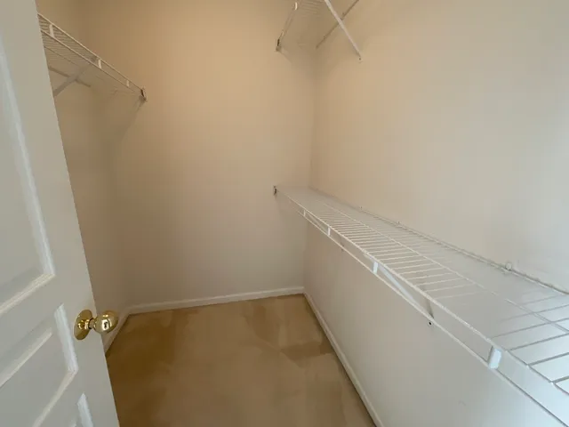 a view of a room with racks on the wall