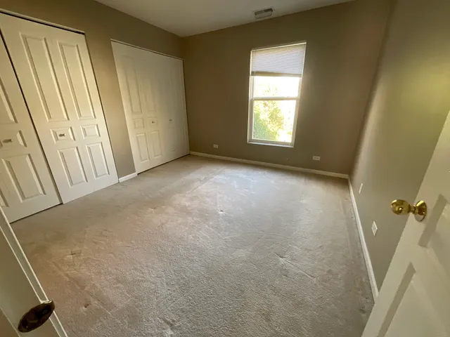 a view of a room with windows