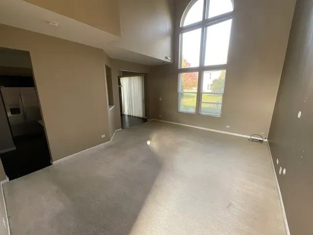 a view of a room with a large window