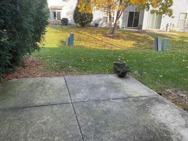 a view of a swimming pool with an outdoor space