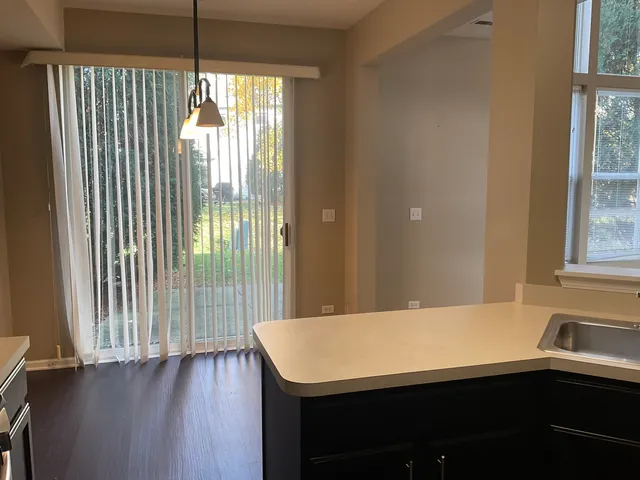 a view of a room with a window