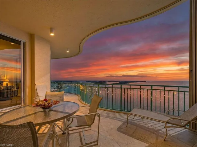 a view of a chairs and table on the terrace