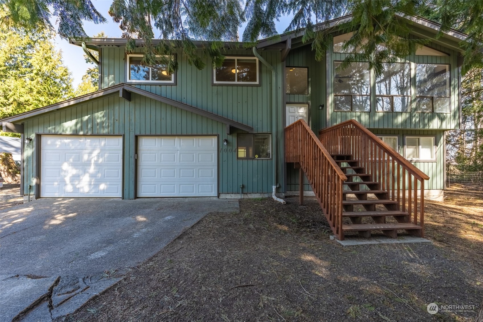 1004 Shaw Road Ferndale, WA 98248 - Photo 1 of 36 a view of a house with a yard