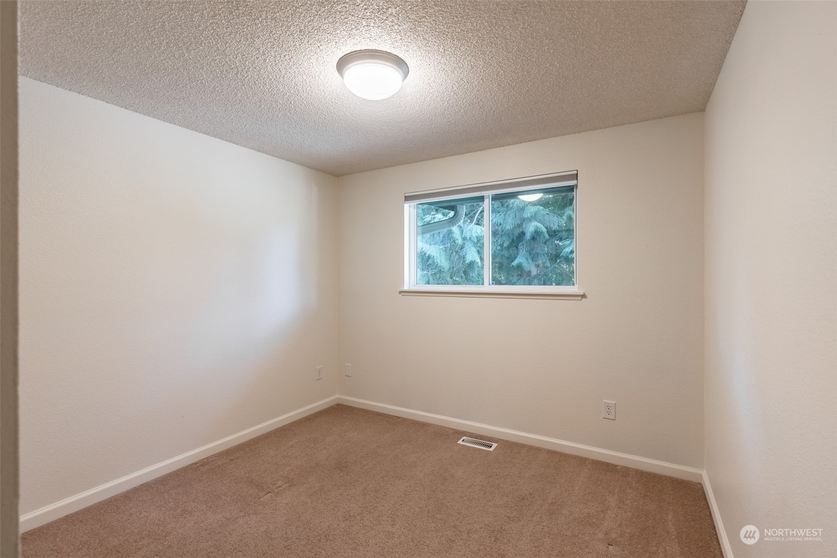 1004 Shaw Road Ferndale, WA 98248 - Photo 16 of 36 an empty room with windows