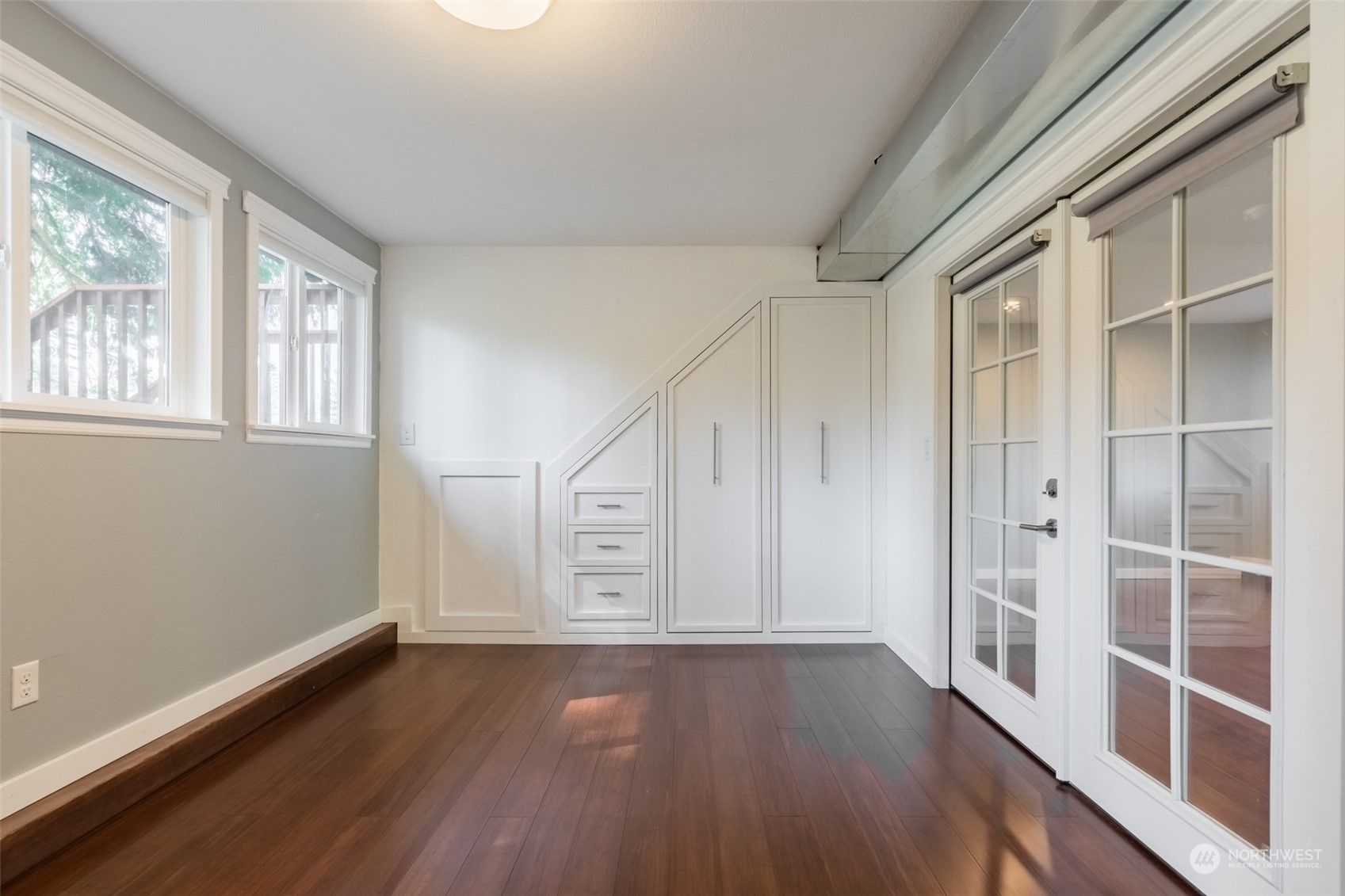 1004 Shaw Road Ferndale, WA 98248 - Photo 23 of 36 an empty room with wooden floor and windows