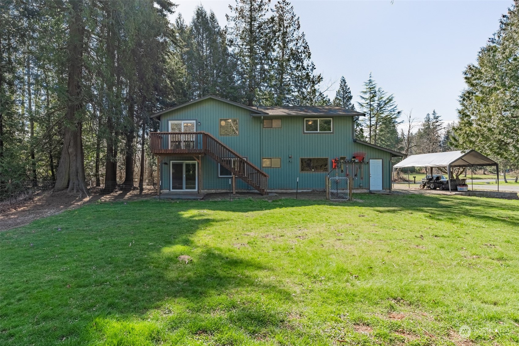 1004 Shaw Road Ferndale, WA 98248 - Photo 30 of 36 a front view of a house with garden