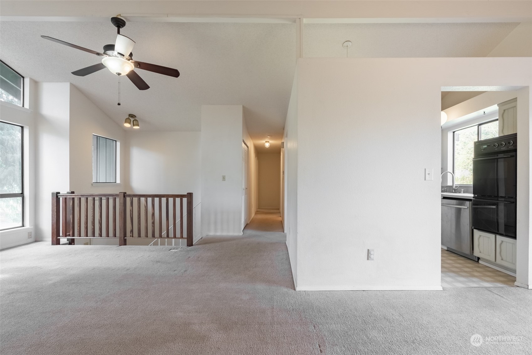 1004 Shaw Road Ferndale, WA 98248 - Photo 6 of 36 a view of a hallway with a chandelier fan