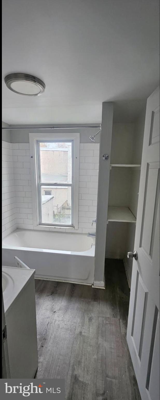 1902 Brunner Street Philadelphia, PA 19140 - Photo 11 of 11 a view of walk in closet with clothes and shoes