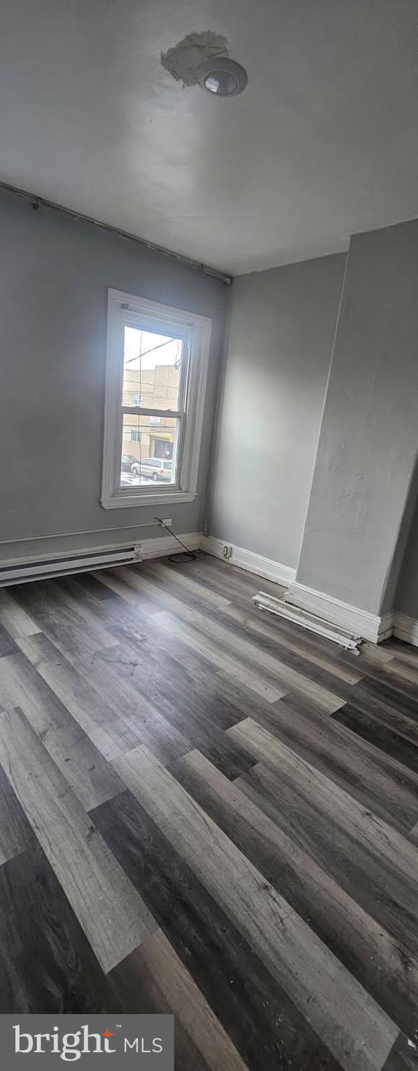 1902 Brunner Street Philadelphia, PA 19140 - Photo 6 of 11 a view of an empty room and window