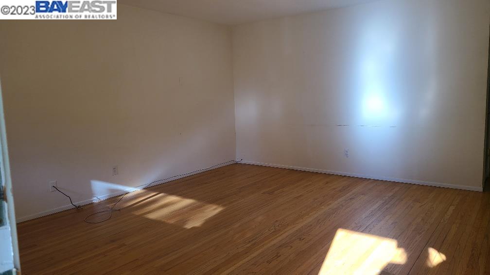 1501 L Street Davis, CA 95616 - Photo 4 of 23 a view of an empty room and wooden floor