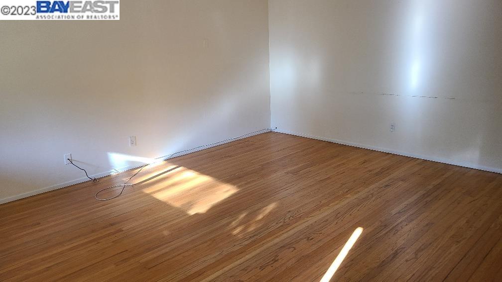 1501 L Street Davis, CA 95616 - Photo 5 of 23 a view of empty room with wooden floor