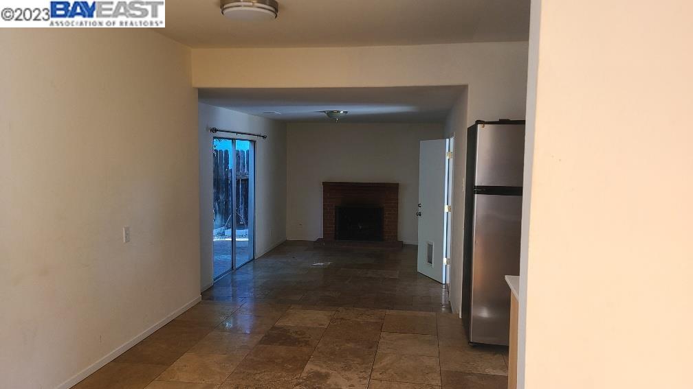 1501 L Street Davis, CA 95616 - Photo 6 of 23 a view of a hallway to an empty room