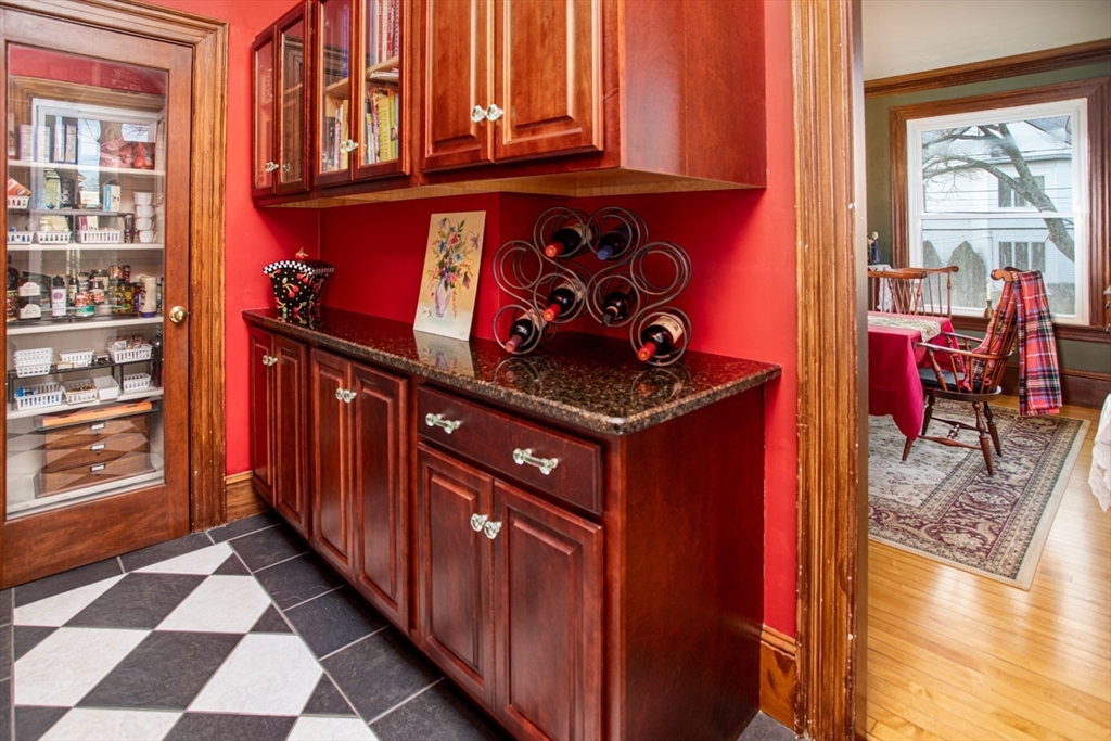 1231 Robeson Street Fall River, MA 02720 - Photo 11 of 39 a kitchen with stainless steel appliances granite countertop a refrigerator and a stove top oven