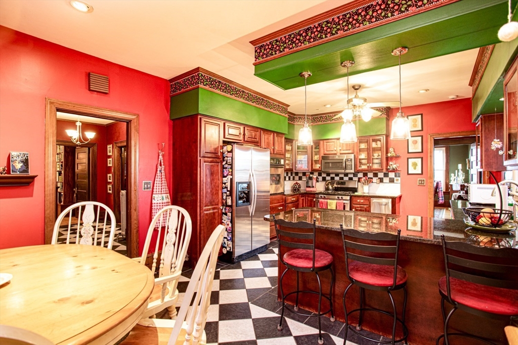 1231 Robeson Street Fall River, MA 02720 - Photo 13 of 39 a dinning table and chairs in a room