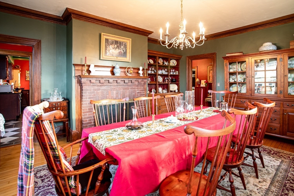 1231 Robeson Street Fall River, MA 02720 - Photo 20 of 39 a dining room filled with furniture and chandelier