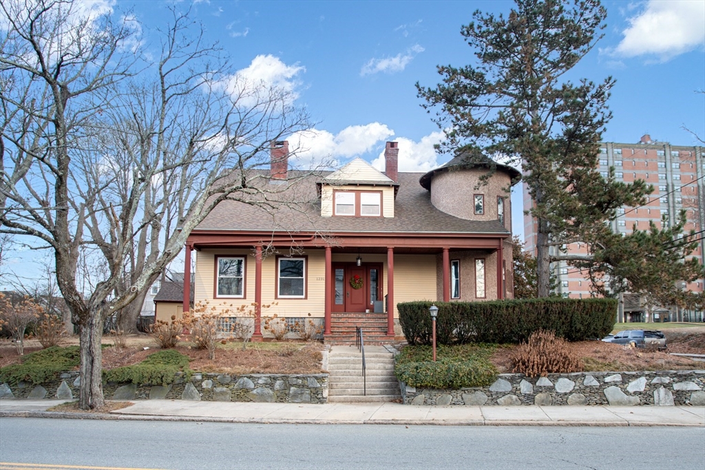 1231 Robeson Street Fall River, MA 02720 - Photo 2 of 39 a front view of a house with garden
