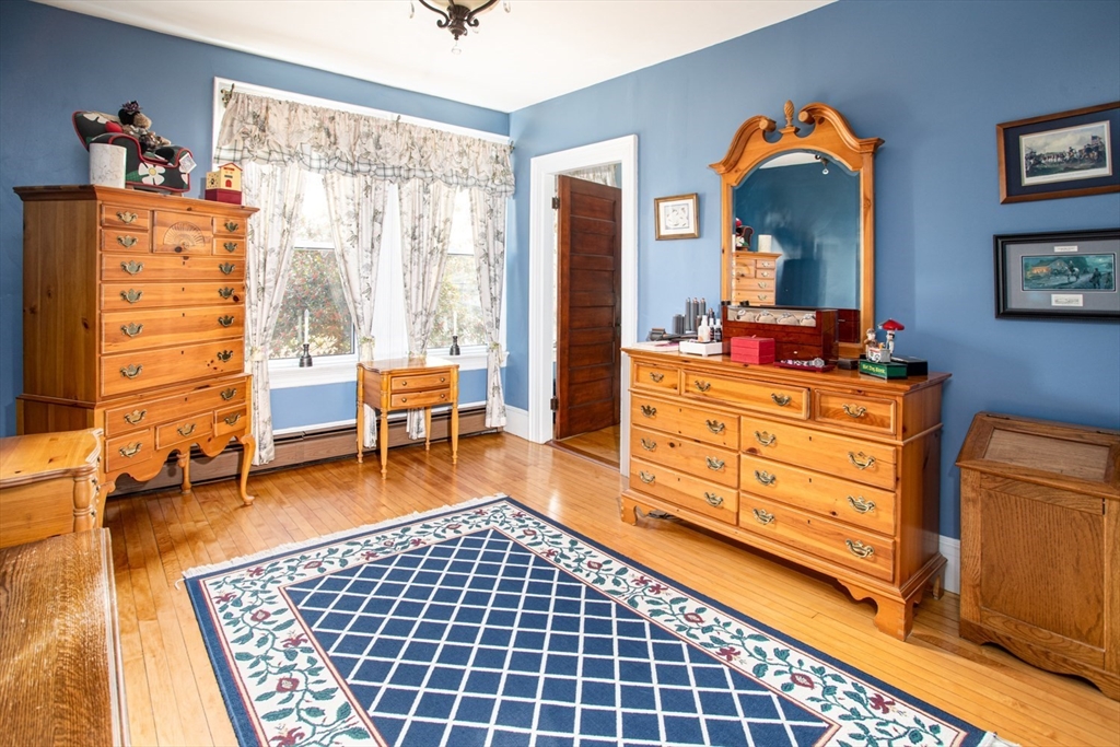 1231 Robeson Street Fall River, MA 02720 - Photo 33 of 39 a living room with furniture and a dresser