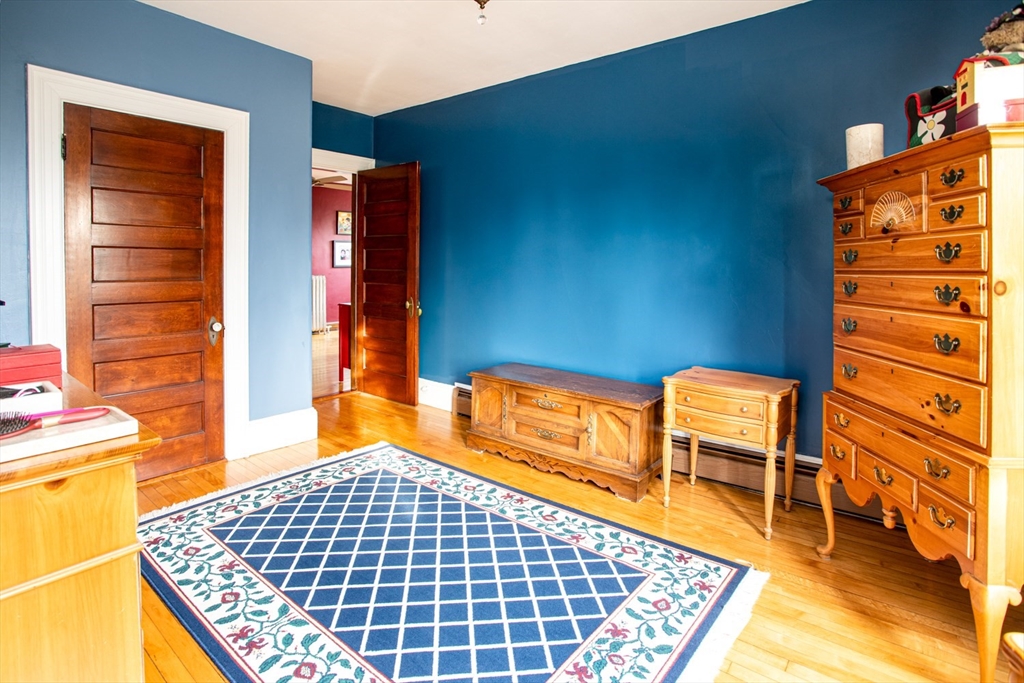 1231 Robeson Street Fall River, MA 02720 - Photo 34 of 39 a backyard of a house with table and chairs