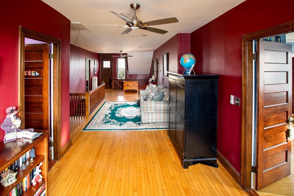 1231 Robeson Street Fall River, MA 02720 - Photo 36 of 39 a living room with furniture and a flat screen tv