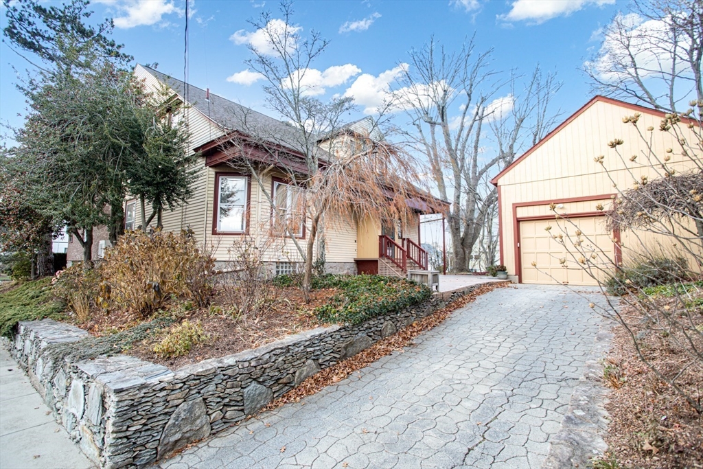1231 Robeson Street Fall River, MA 02720 - Photo 4 of 39 a view of a house with a yard